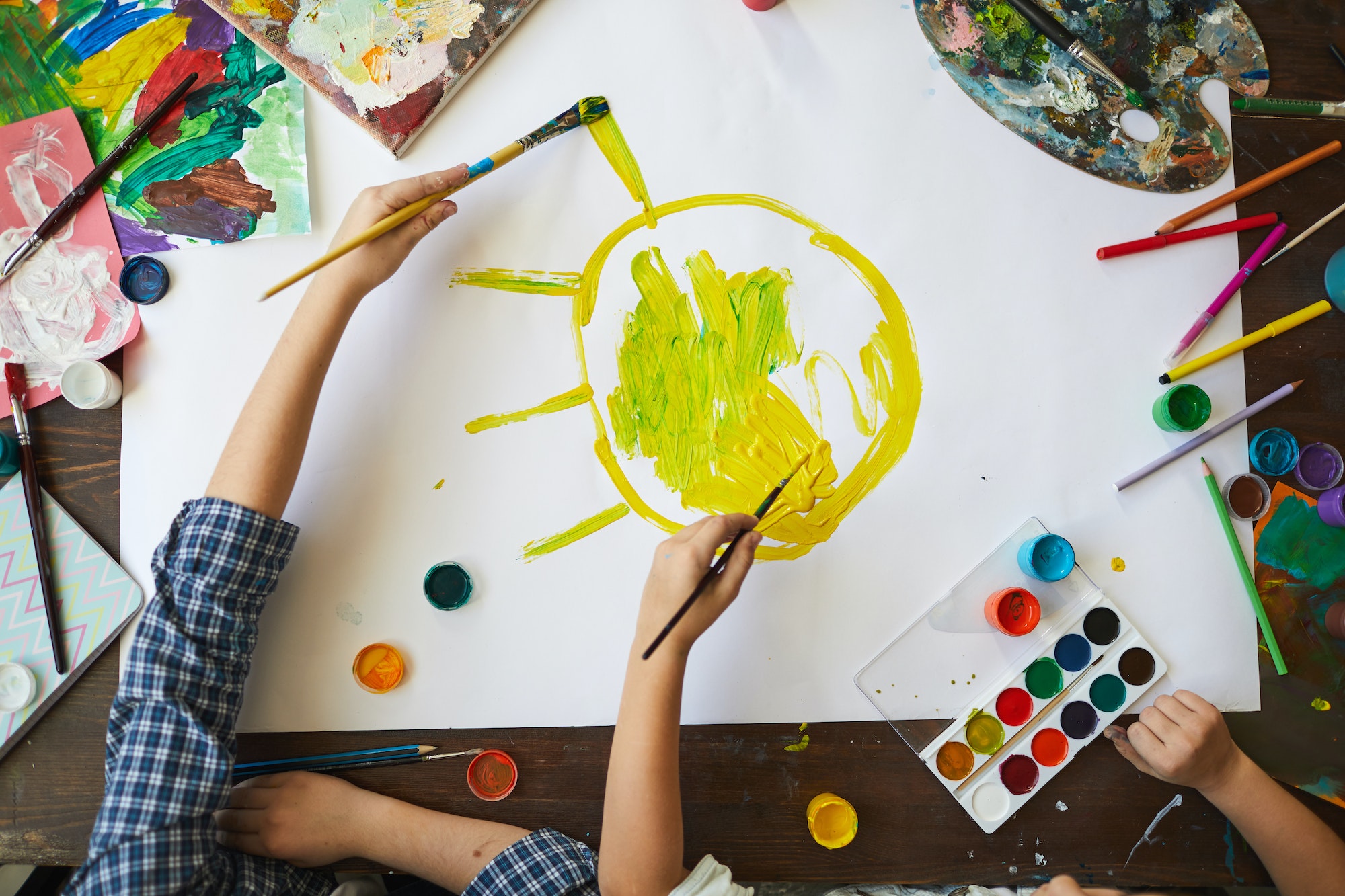 Kids Painting Sun Above View